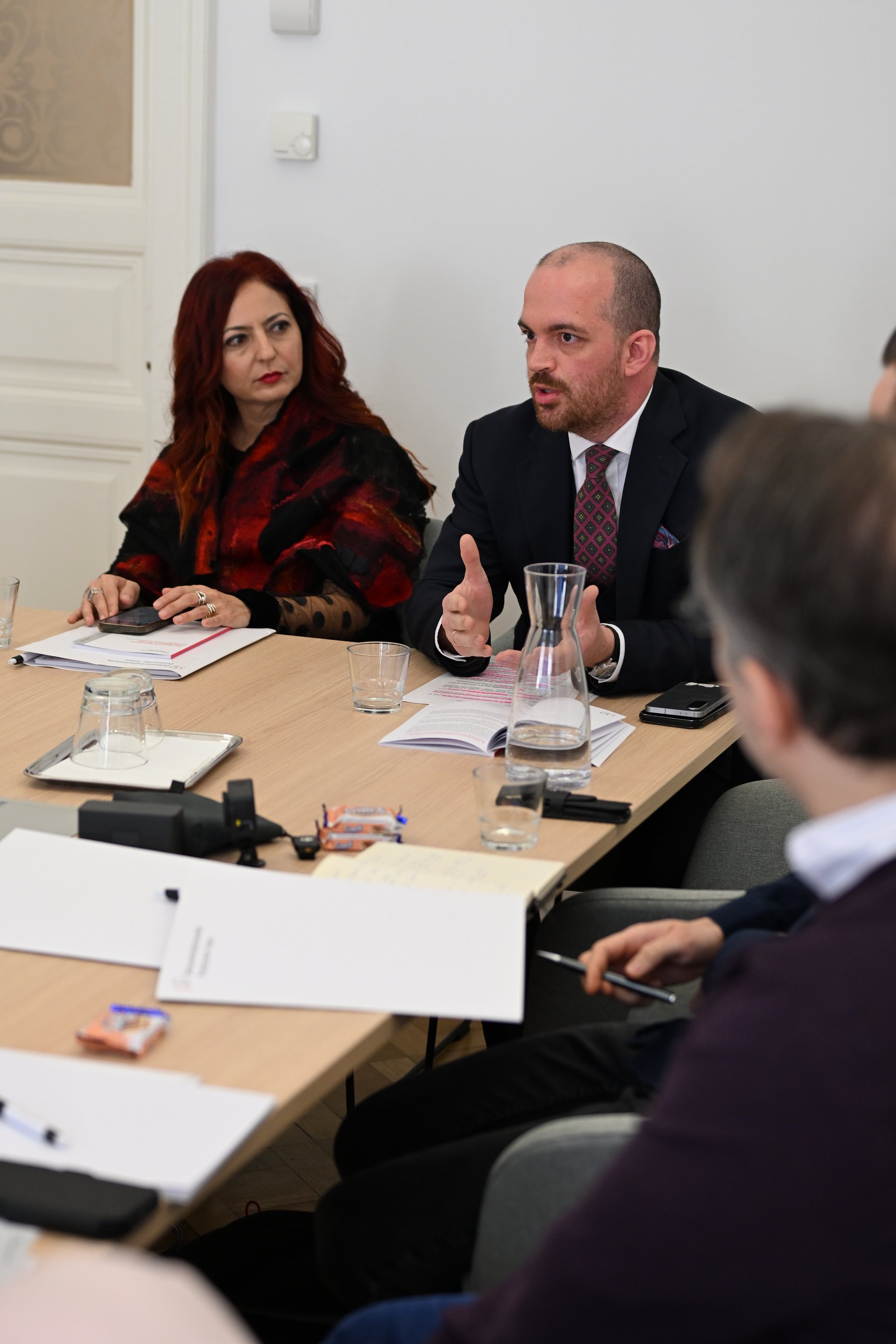Lina Khatib and Ferdinand Haberl speaking with journalists